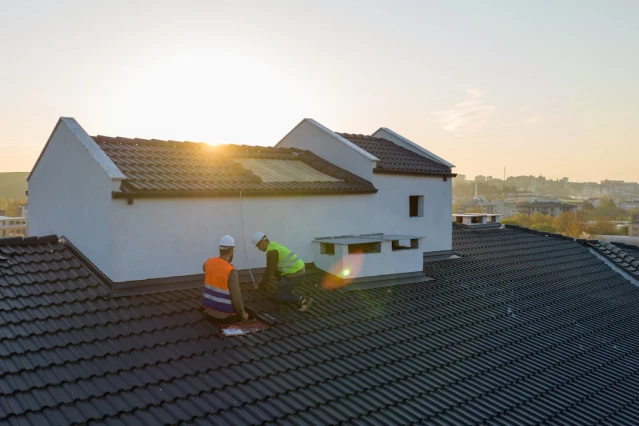 workers on a roof